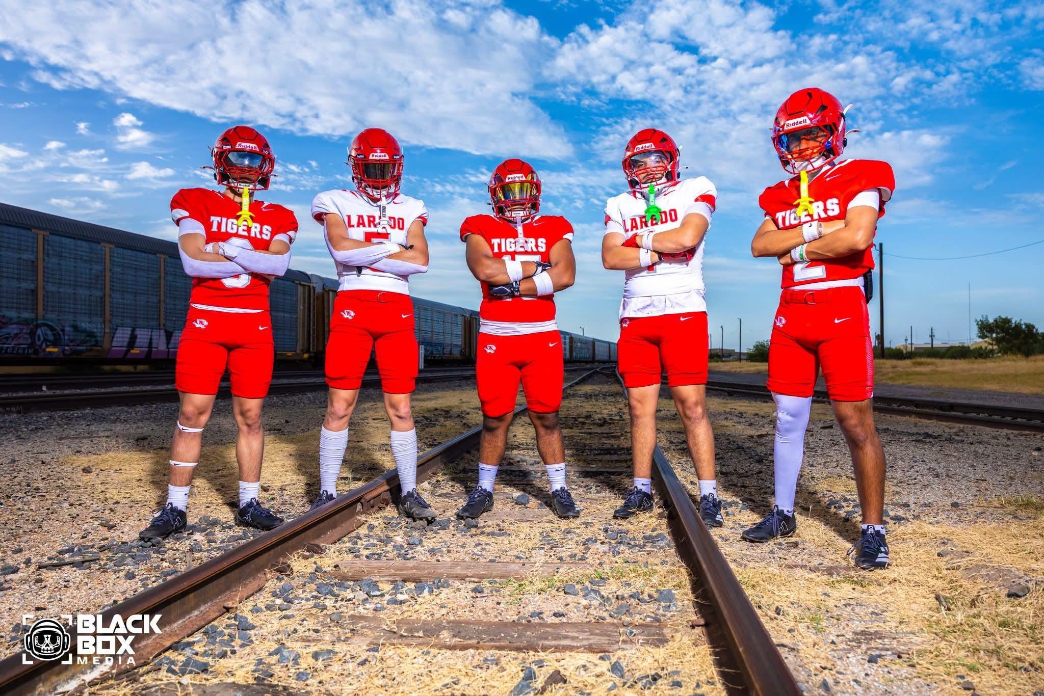 Martin Tigers football players in red and white uniforms